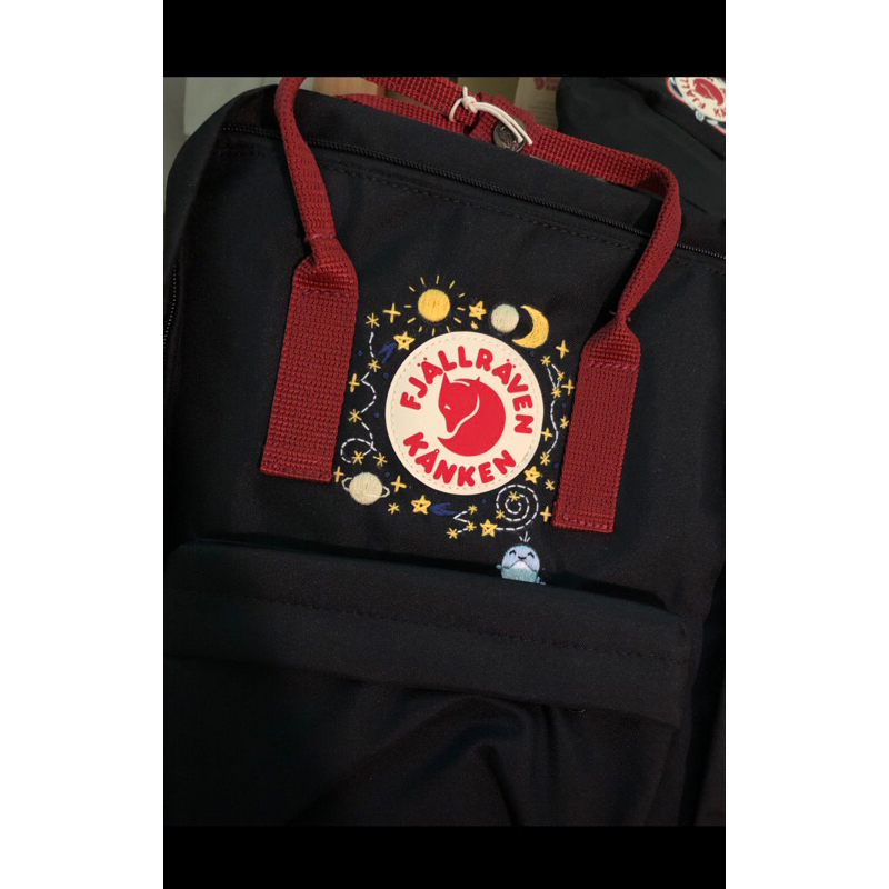 Kanken black with red straps best sale