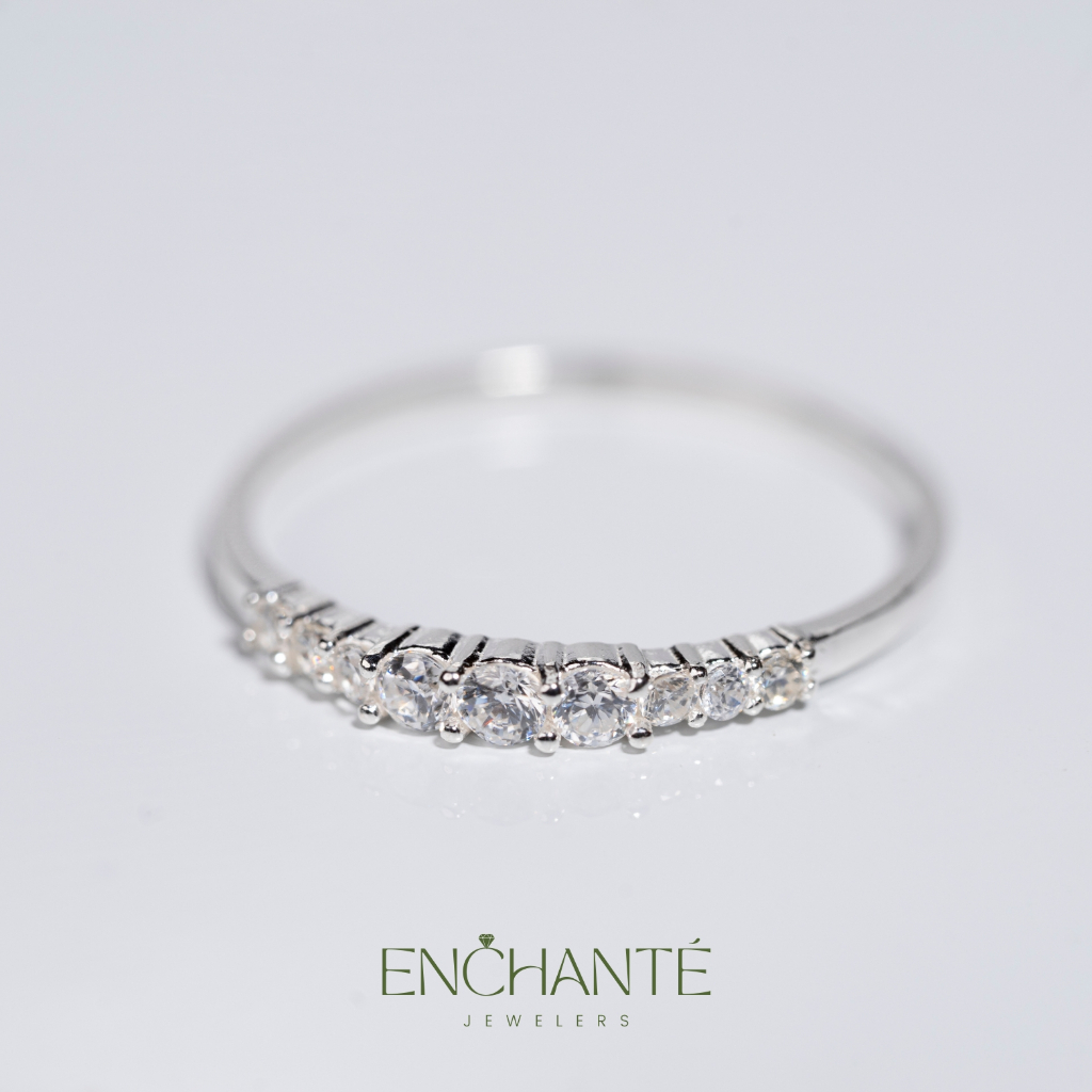 Enchanté women's silver ring with three small sparkling stones Enchanté ...
