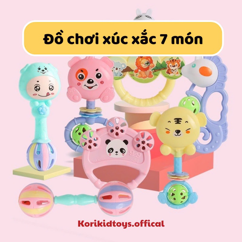 Hand-held 7 Piece rattle dice toy set shaped like cartoon characters ...