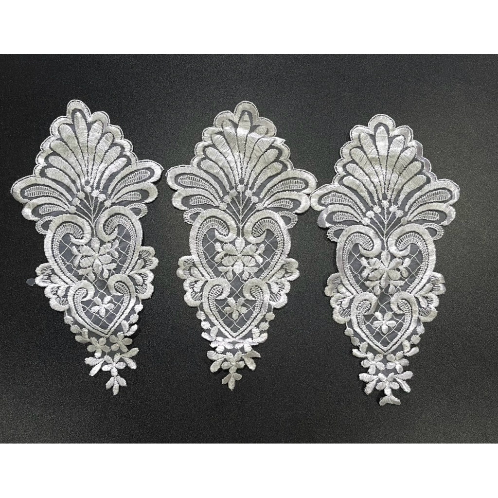Embroidered lace, patchwork lace used for wedding dresses, decorations ...